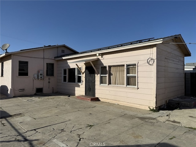 view of front of house with a patio