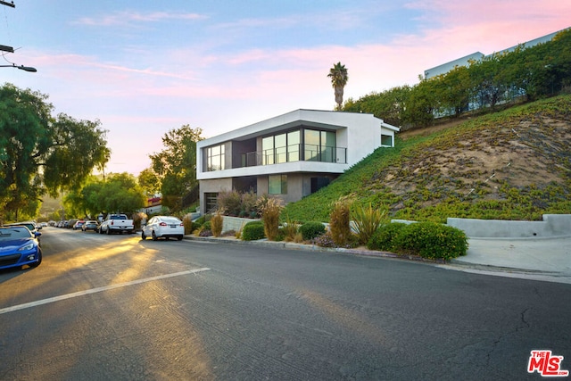 exterior space featuring a balcony