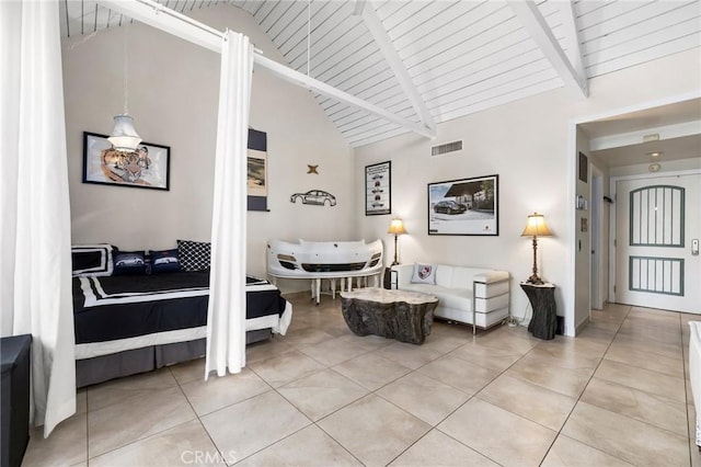 interior space featuring tile patterned floors, lofted ceiling with beams, and wooden ceiling