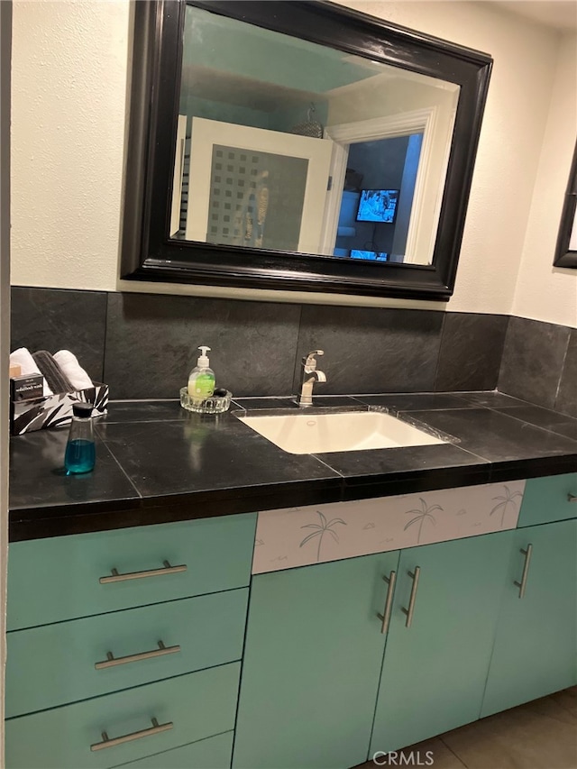 bathroom with vanity and tile patterned floors