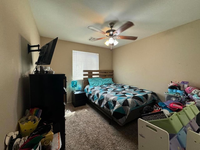 bedroom featuring ceiling fan and carpet floors