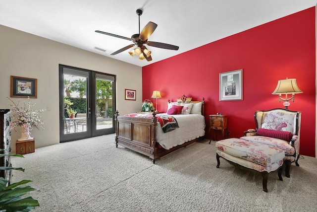 carpeted bedroom featuring access to outside, ceiling fan, and french doors