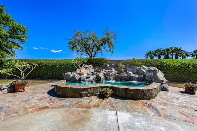 view of pool featuring a patio