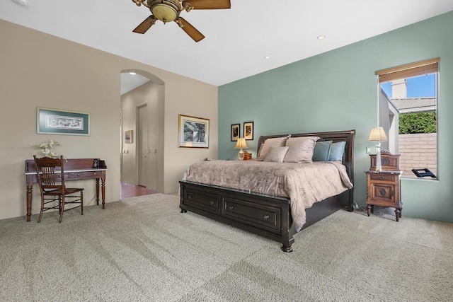 carpeted bedroom with ceiling fan