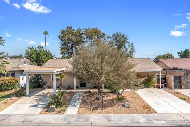 view of front of property with a carport