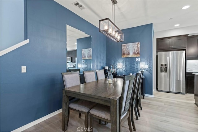 dining area featuring light hardwood / wood-style flooring