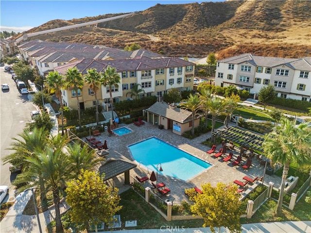 view of pool with a mountain view