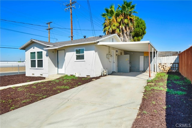 view of front of house with a carport