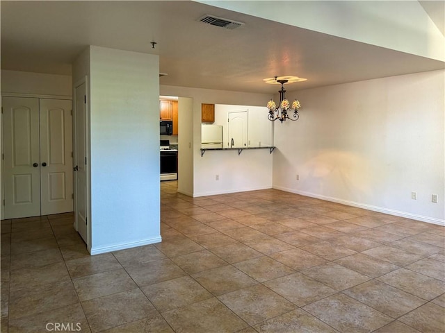 interior space with an inviting chandelier