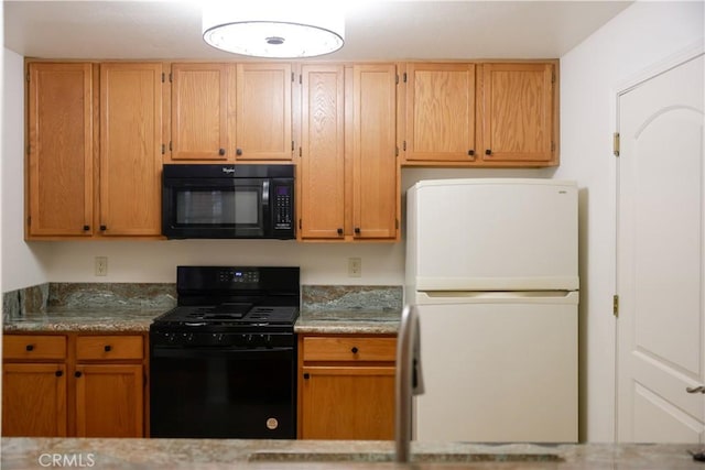 kitchen with black appliances