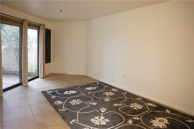 view of tiled spare room