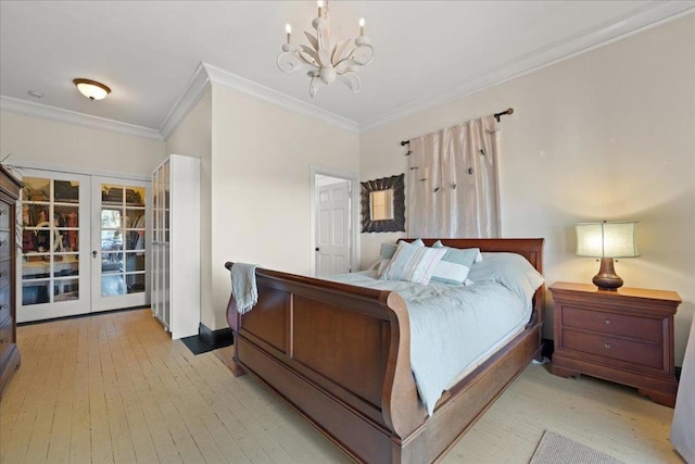 bedroom with a notable chandelier, access to outside, crown molding, light hardwood / wood-style floors, and french doors