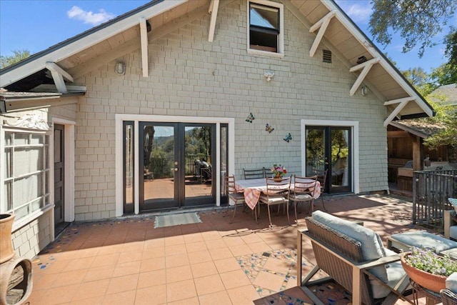 back of house with a patio area