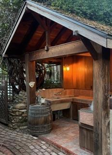 view of patio with a bar and a gazebo