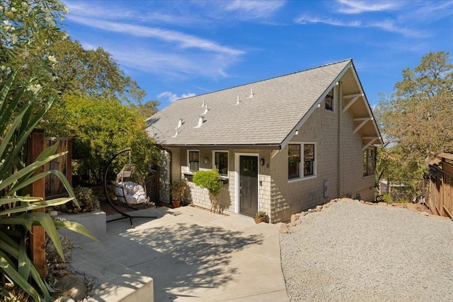 back of house with a patio area