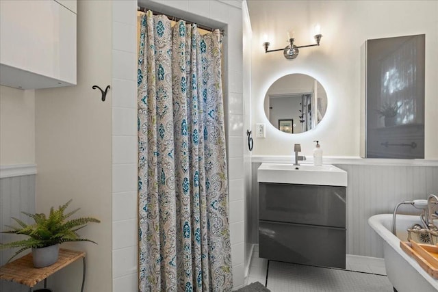 bathroom with vanity, shower with separate bathtub, and tile patterned floors