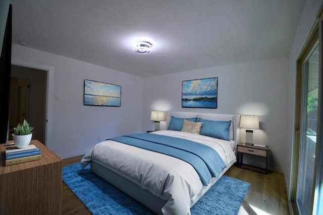 bedroom featuring dark hardwood / wood-style floors