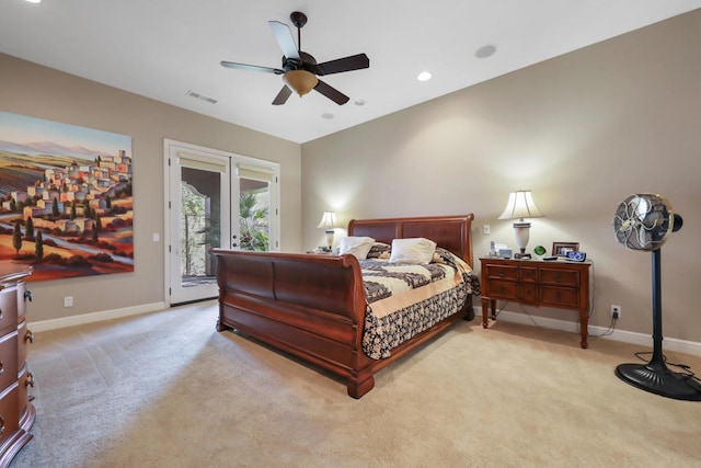 carpeted bedroom with ceiling fan and access to exterior