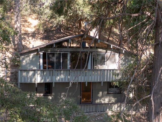 view of property exterior with a balcony