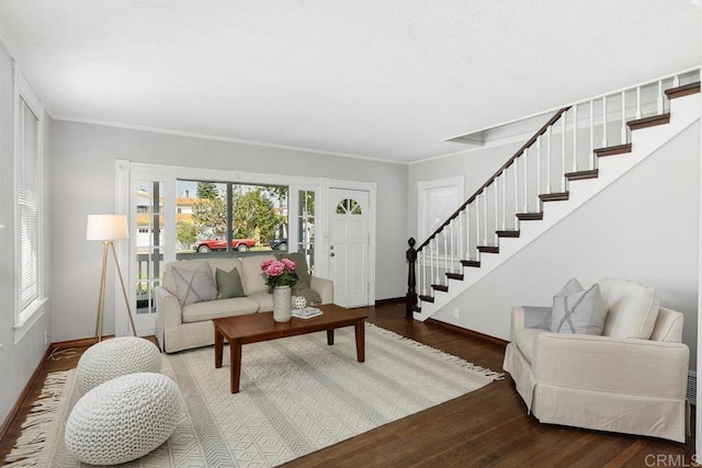 living room featuring ornamental molding and hardwood / wood-style floors