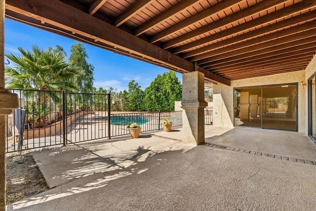 view of patio / terrace featuring a fenced in pool