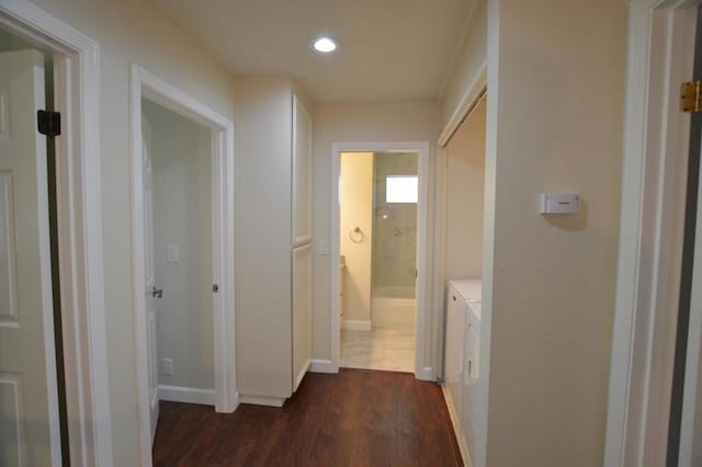 corridor with dark wood-type flooring