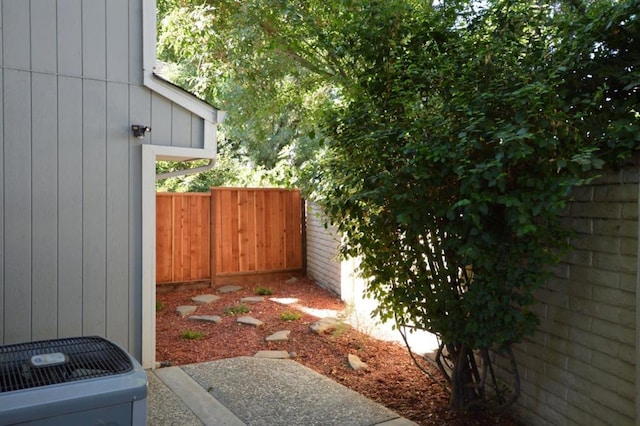 view of yard featuring central AC unit