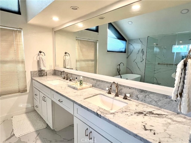 bathroom with separate shower and tub and vanity