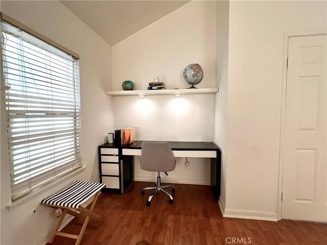 office area featuring vaulted ceiling and dark hardwood / wood-style flooring