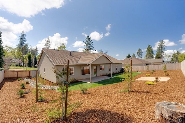 rear view of house with a patio area