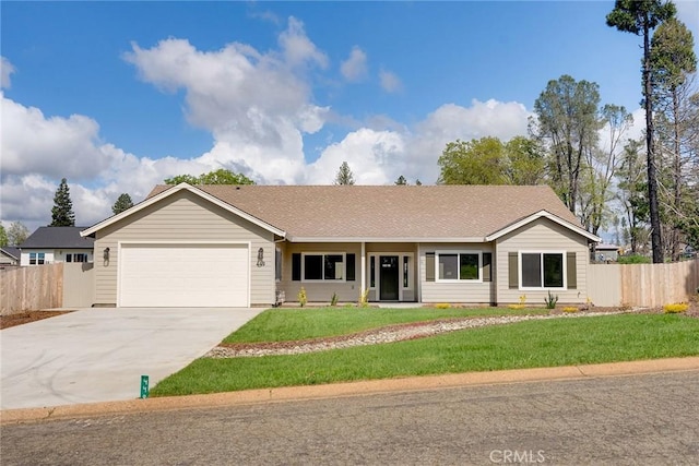 ranch-style home featuring a garage and a front lawn