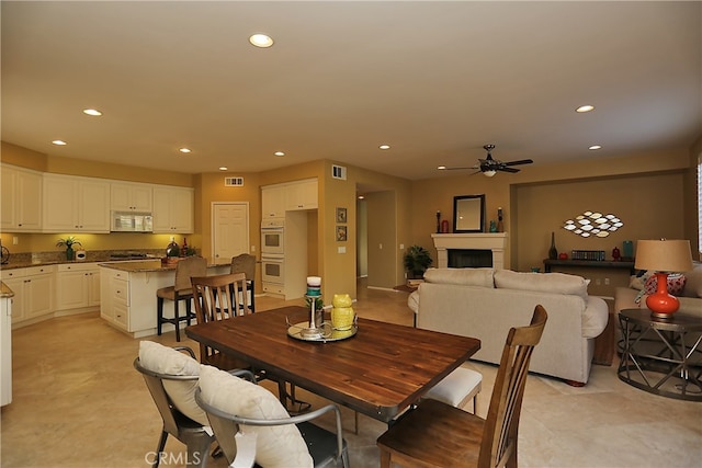 dining room with ceiling fan