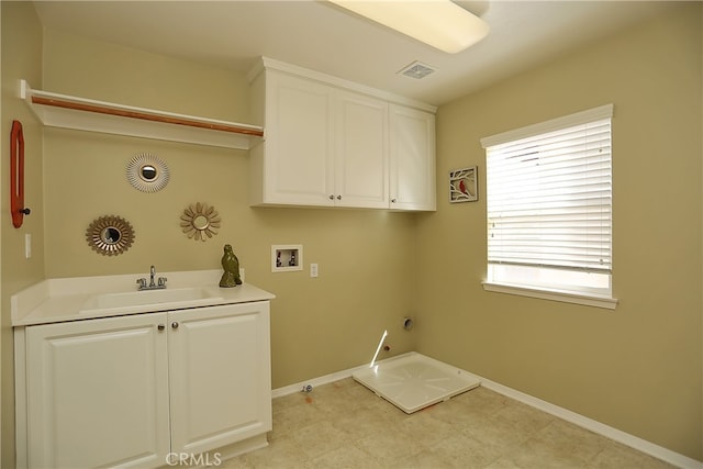 washroom with sink, gas dryer hookup, and washer hookup