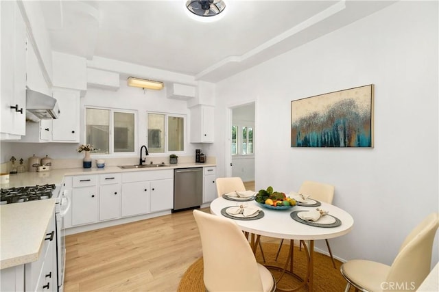 3959 Denker Ave, Los Angeles, CA 90062 - kitchen featuring stainless steel dishwasher, a sink, ventilation hood, light wood finished floors, and gas range gas stove