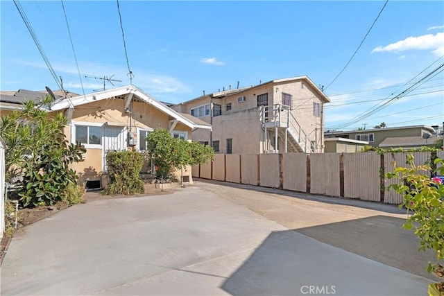 3959 Denker Ave, Los Angeles, CA 90062 - rear view of property with stucco siding