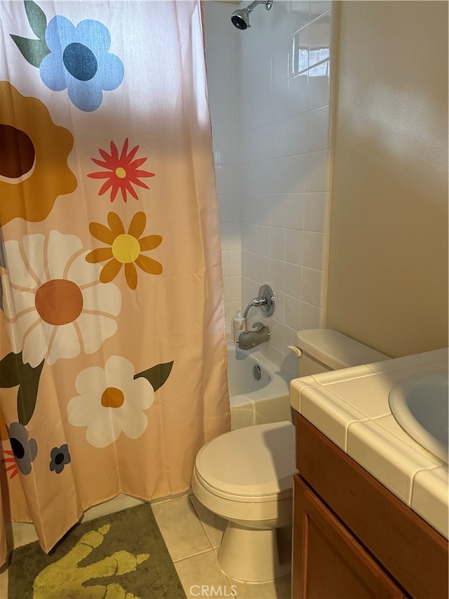 full bathroom with vanity, tile patterned flooring, toilet, and shower / bathtub combination with curtain