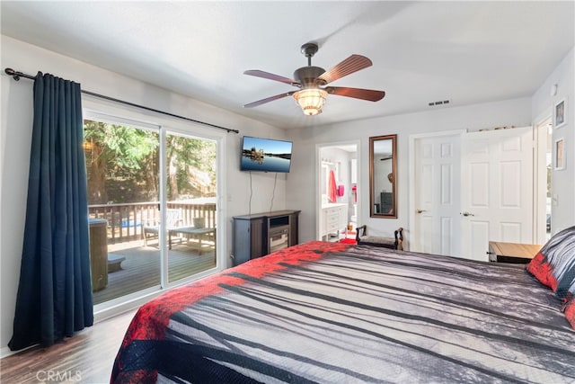 bedroom featuring access to outside, connected bathroom, ceiling fan, and hardwood / wood-style flooring