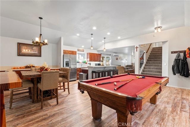 playroom with pool table and light hardwood / wood-style floors