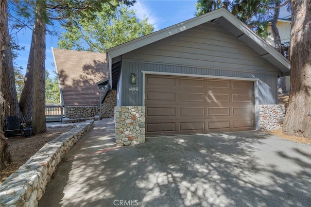 garage with wood walls