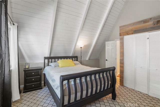 bedroom with wood ceiling and vaulted ceiling with beams