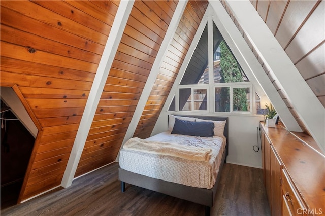 bedroom with wood ceiling, dark hardwood / wood-style floors, and vaulted ceiling