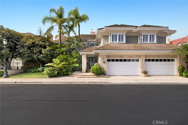 view of front of property with a garage