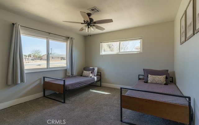 bedroom featuring ceiling fan and carpet flooring