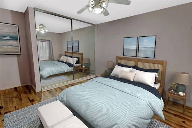 bedroom featuring wood-type flooring, a closet, and ceiling fan