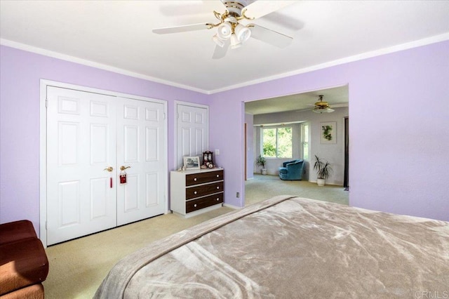 bedroom with light carpet, ceiling fan, and ornamental molding