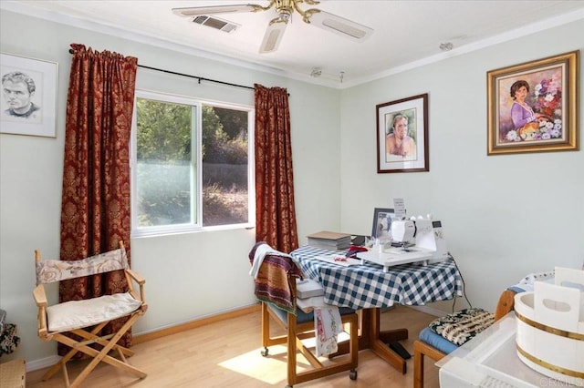 dining room featuring light hardwood / wood-style floors and ceiling fan