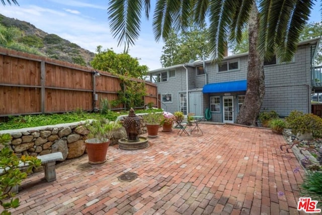 view of patio featuring a mountain view