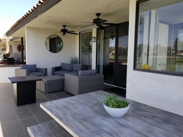 view of patio featuring ceiling fan and an outdoor hangout area