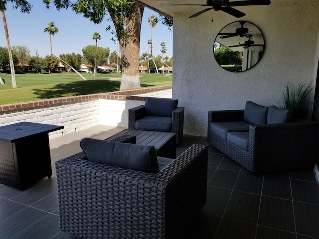 view of patio with an outdoor hangout area and ceiling fan