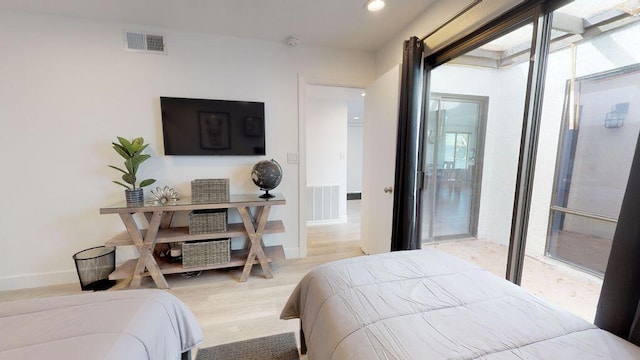 bedroom featuring hardwood / wood-style floors